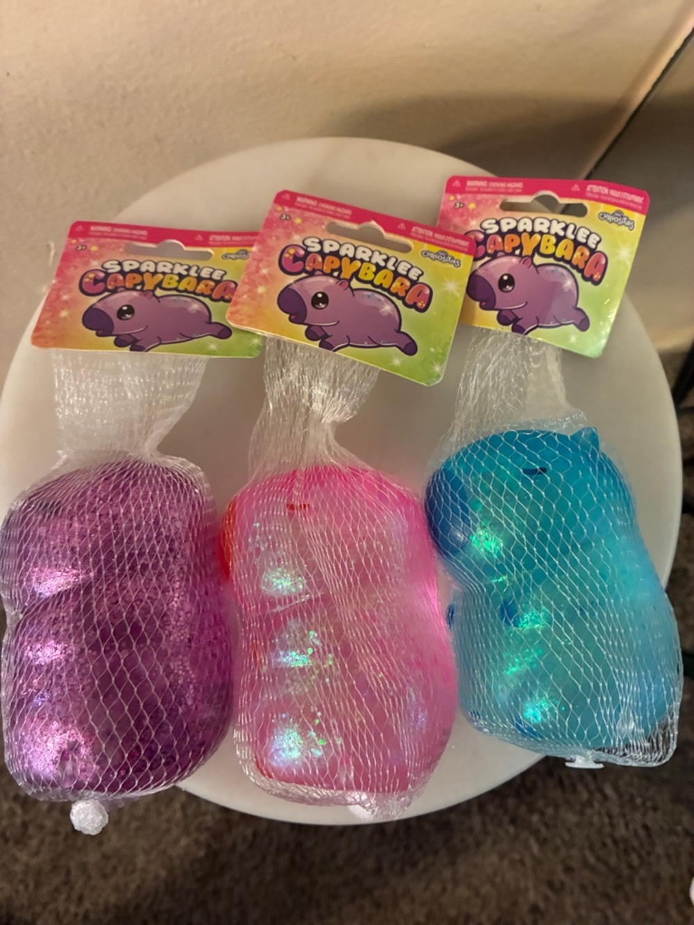 Orb Curiosities Sparkle Capybara Squishy Toy - Purple, Pink, Blue (Set of 3)